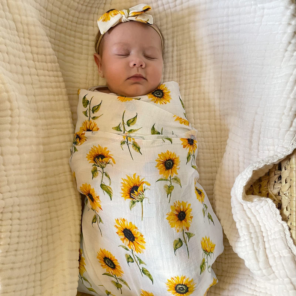 LifeTree bamboo cotton swaddle with headband bow, gentle on baby skin.