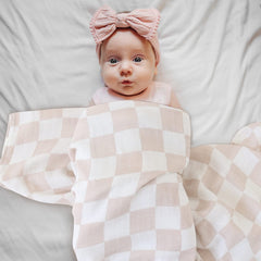 LifeTree muslin swaddle newborn snug wrap in action.