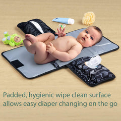 Lil Fox changing pad pockets organized for wipes and diapers.