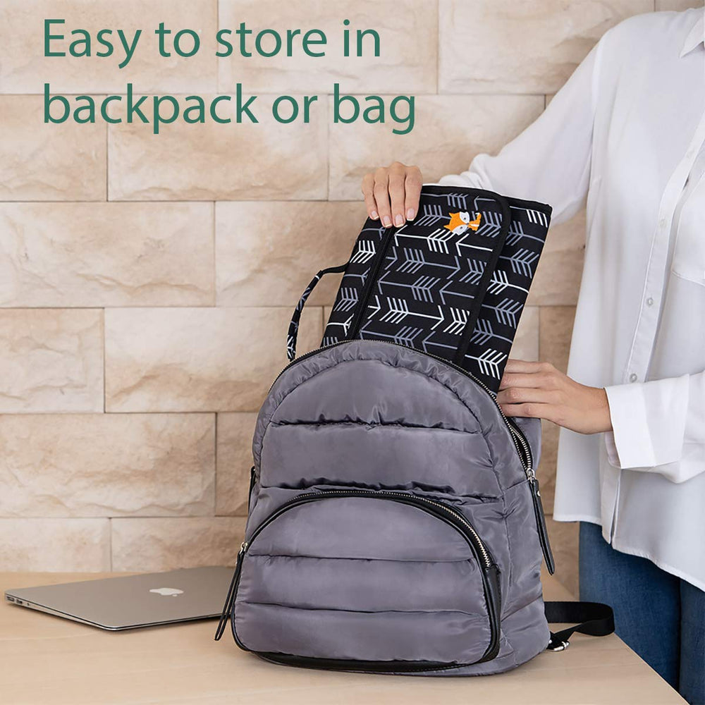 Lil Fox diaper clutch strap attaches to stroller for hands-free use.