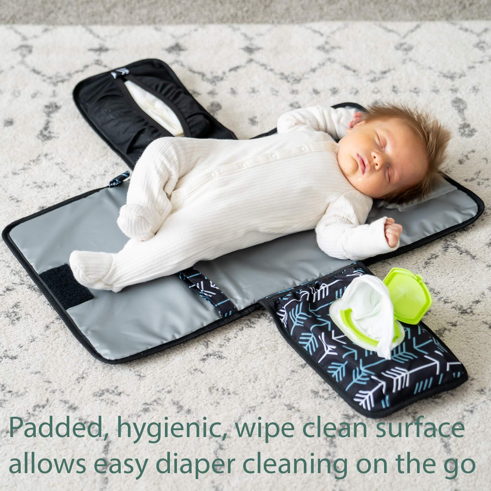 Lil Fox changing pad in use for a quick one-handed diaper change.