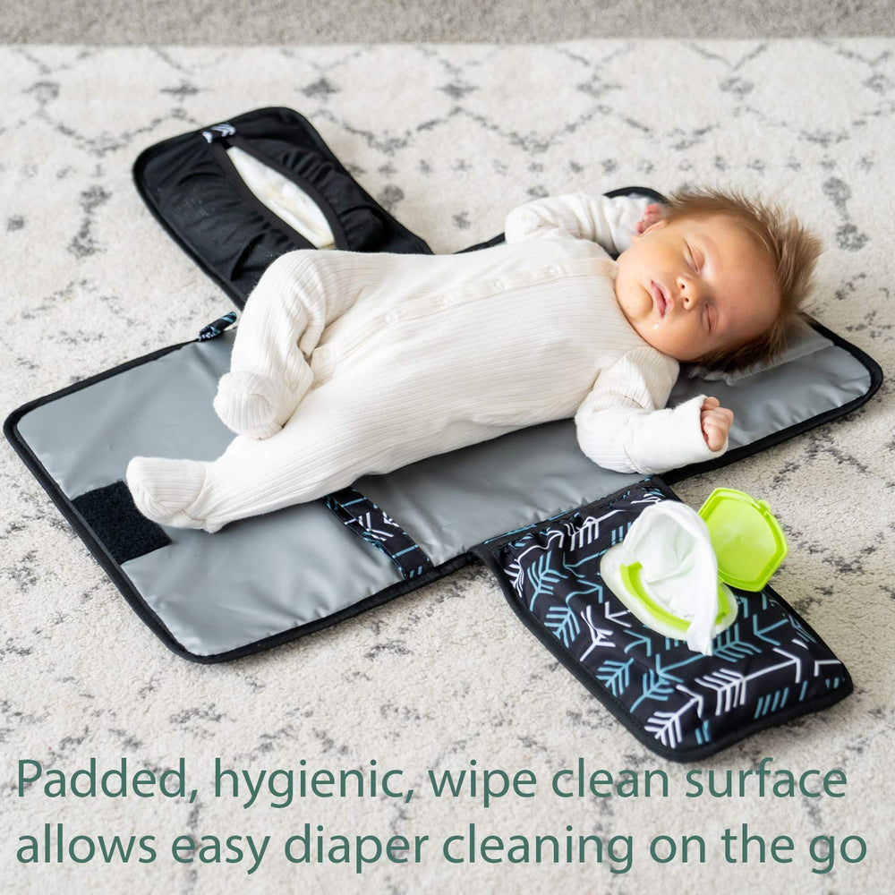 Lil Fox changing pad in use for a quick one-handed diaper change.