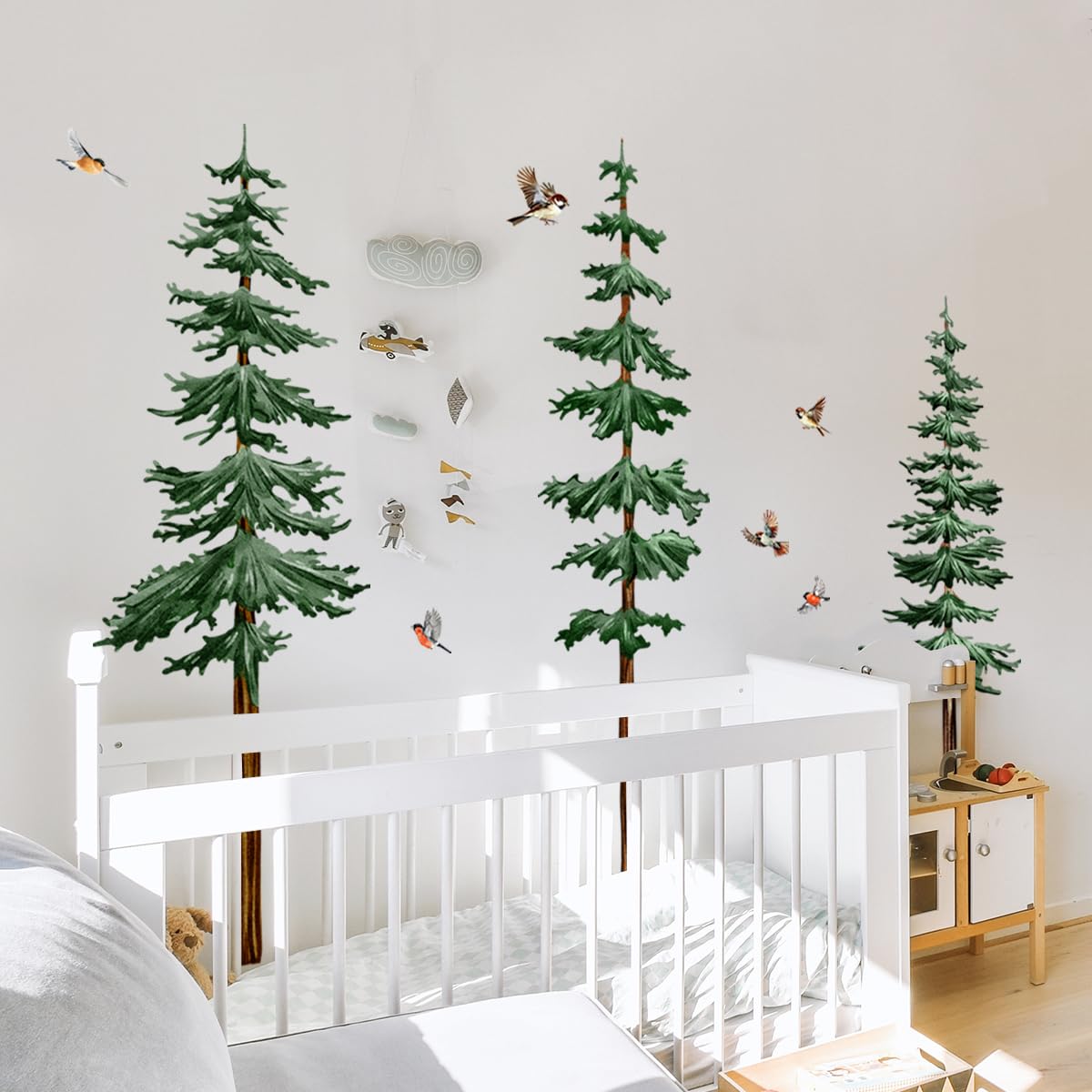 Lilacanthara pine tree wall decal creates a calm forest scene for nurseries.