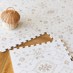 Lillefolk baby play mat 6x6ft vintage vanilla tiles provide soft, safe floor padding for tummy time.