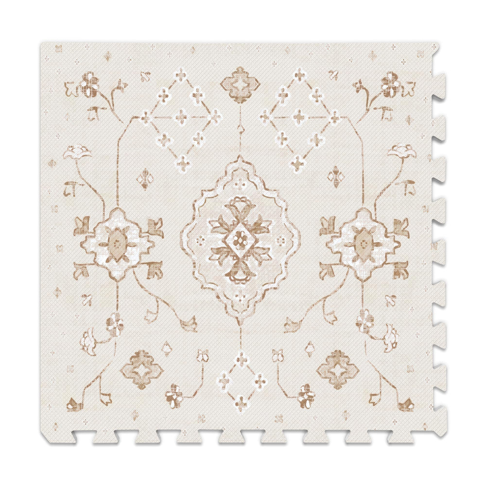 Lillefolk baby play mat halfinch-thick foam tiles provide cushioned tummy time.