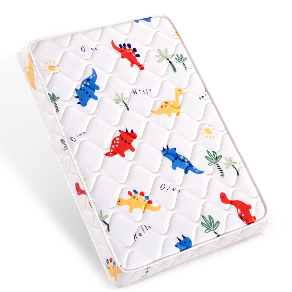 Lillibearas Pack and Play Mattress topper close-up shows firm foam support for babies.