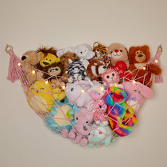 Lilly's Love macrame hammock on pink wall stores plush toys