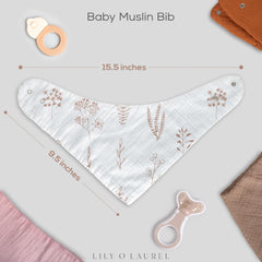 LILY O LAUREL bib with adjustable snaps demonstrates growing fit