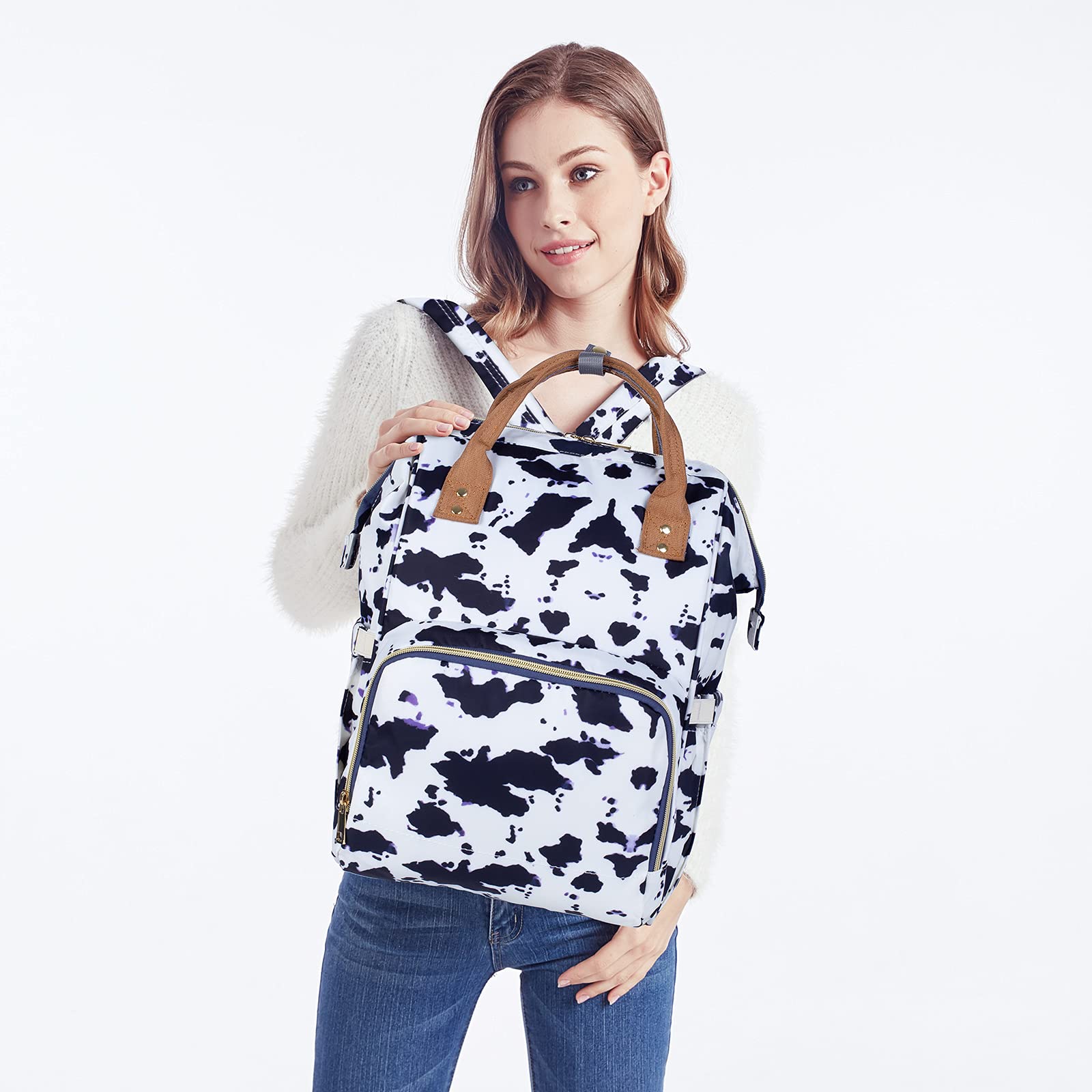 LIMHOO waterproof diaper bag backpack keeps items dry during rainy outings.