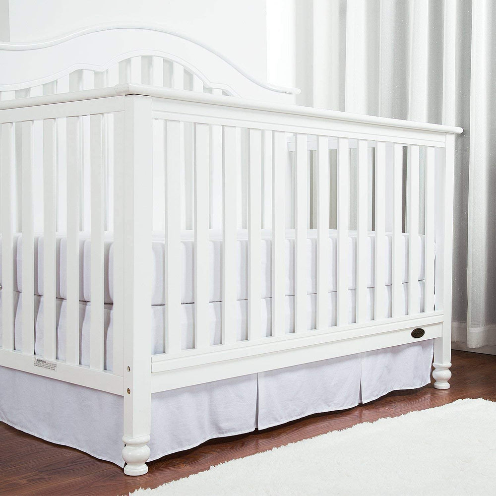 Linens Limited 14-inch-drop crib skirt fits standard cribs for a neat finish.