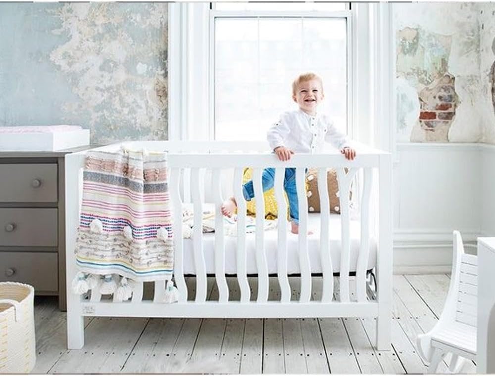 Linens Limited machine-washable crib skirt is easy to care for busy parents.