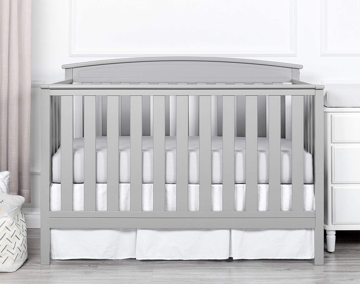 Linens Limited white solid crib bed skirt coordinates with any nursery decor.