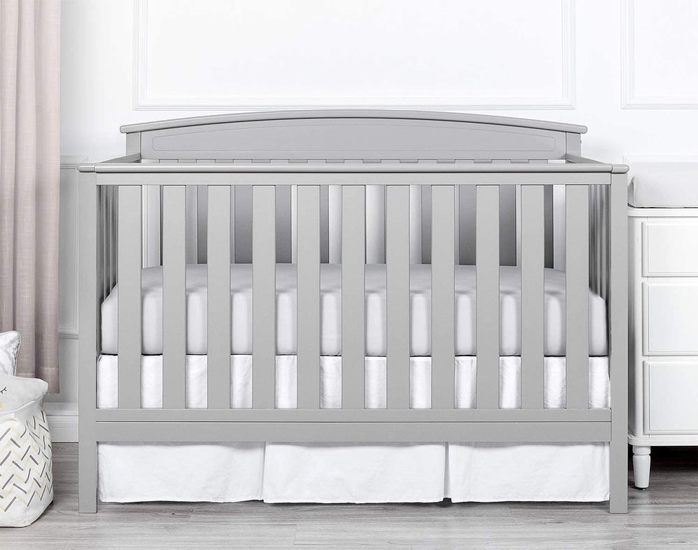 Linens Limited white solid crib bed skirt coordinates with any nursery decor.