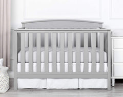 Linens Limited white solid crib bed skirt coordinates with any nursery decor.
