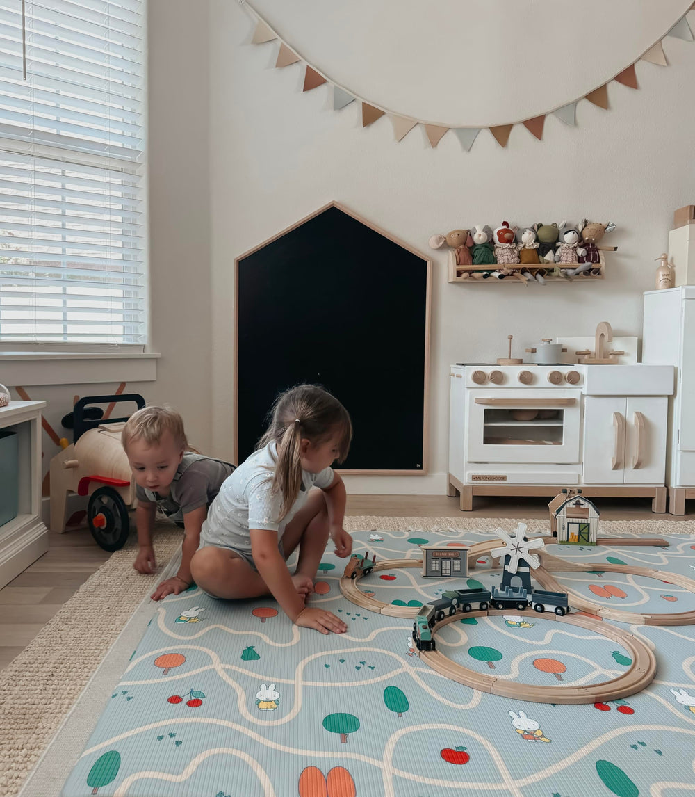 LITTLE Bot Miffy and Friends Ofie Mat reversible design provides two playful moods