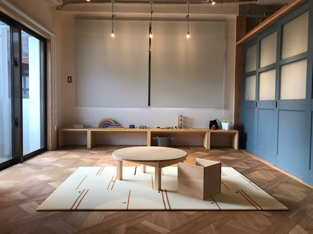Little Bot Ofie Mat complements modern rooms with a playful design-forward look.