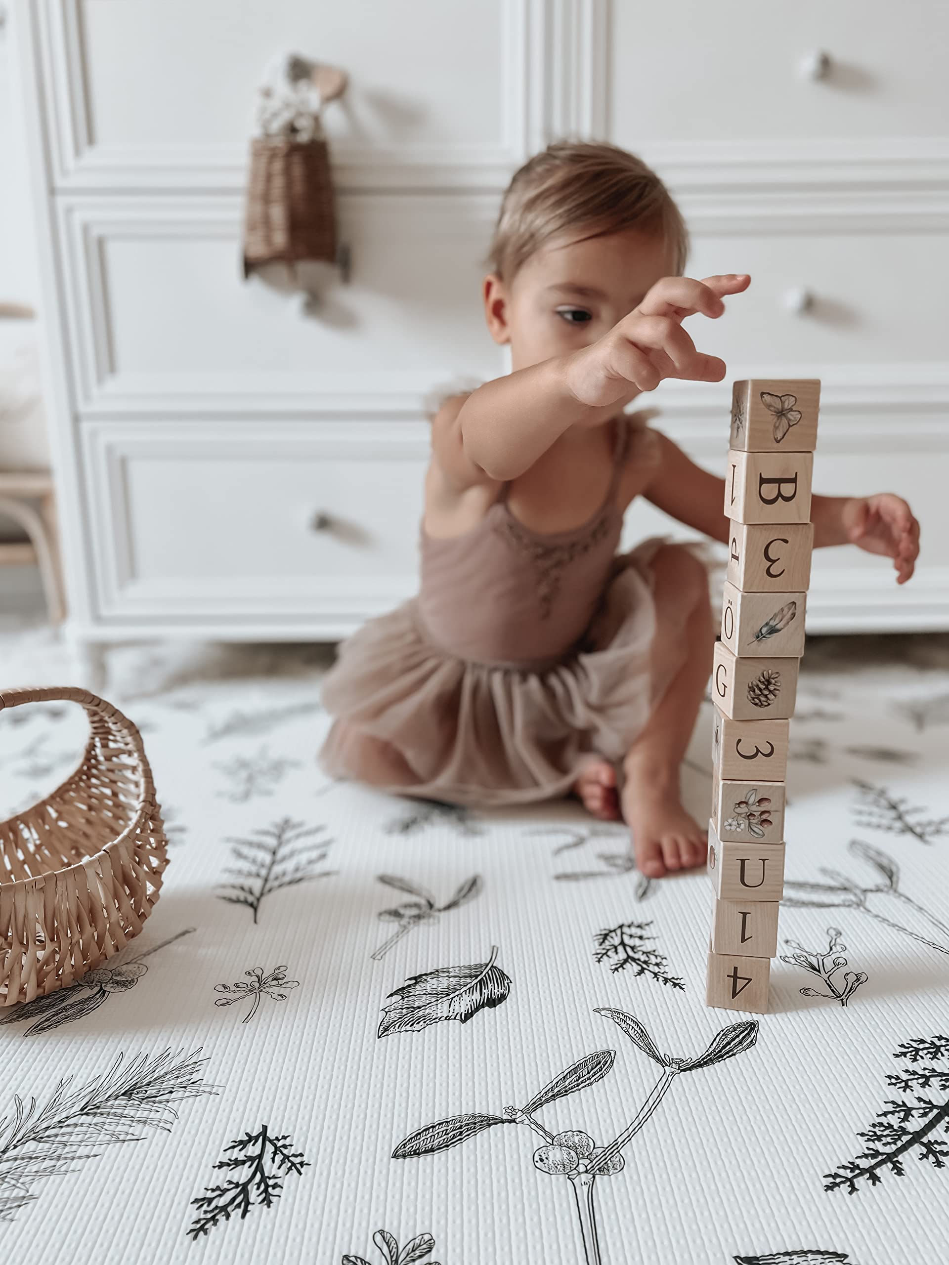 Little Bot Ofie Mat provides a large safe area for floor activities and exploration.