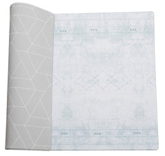 LITTLE Bot Ofie mat with reversible sides for versatile play and decor.