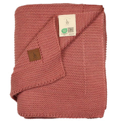 Little Dedi baby blanket in dusky pink front view used as a swaddle or car-seat cover