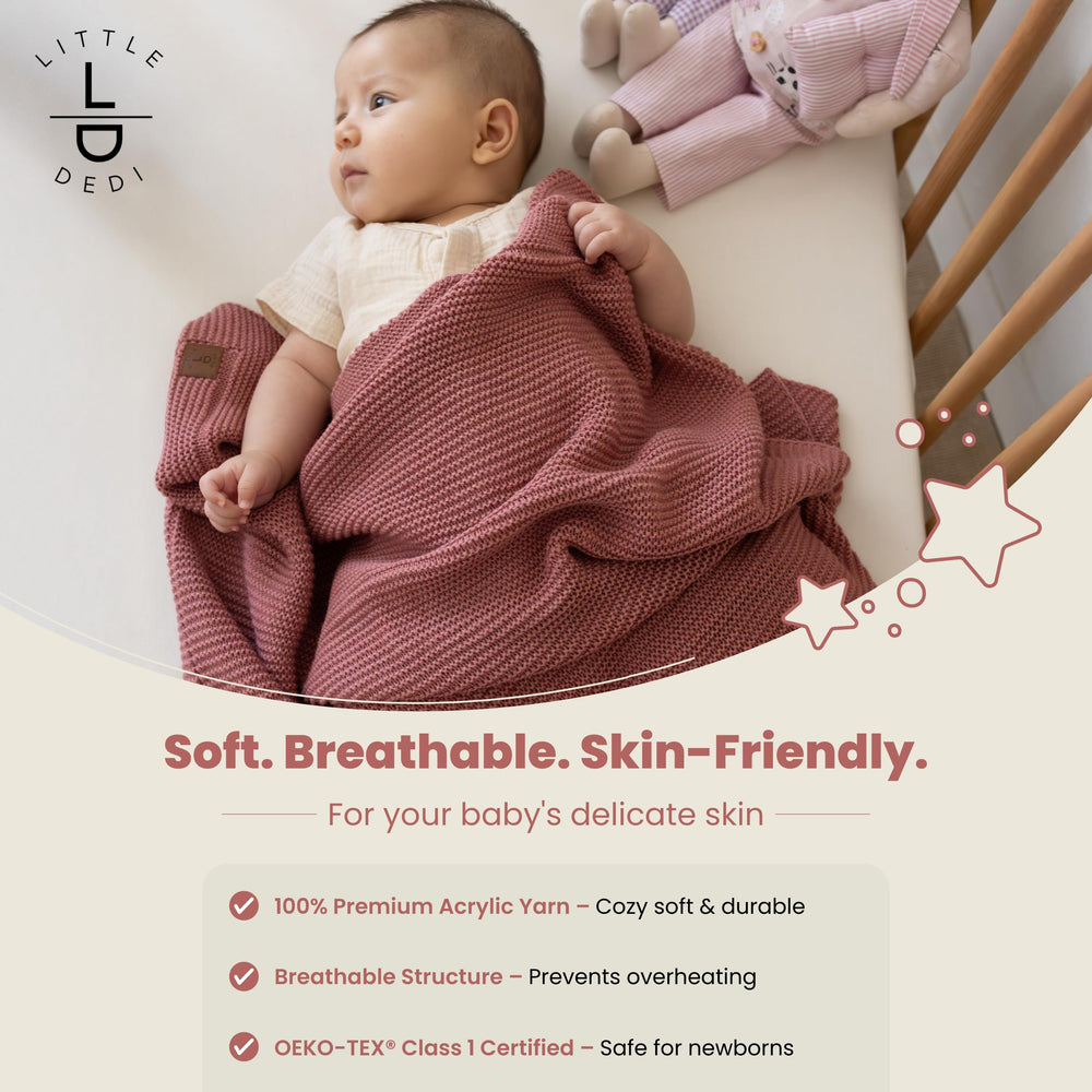Little Dedi baby blanket in dusky pink folded close-up, ultra-soft fibers for snuggling