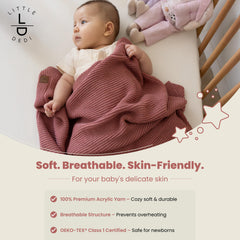 Little Dedi baby blanket in dusky pink folded close-up, ultra-soft fibers for snuggling