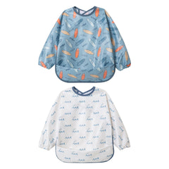 Little Dimsum long-sleeve feeding bib with surf print keeps clothes clean during meals.