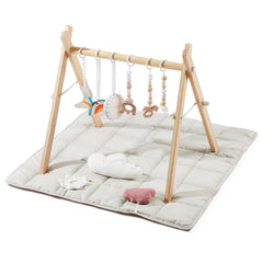 Little Dove baby gym with mat in natural pine creates a cozy, safe play space.