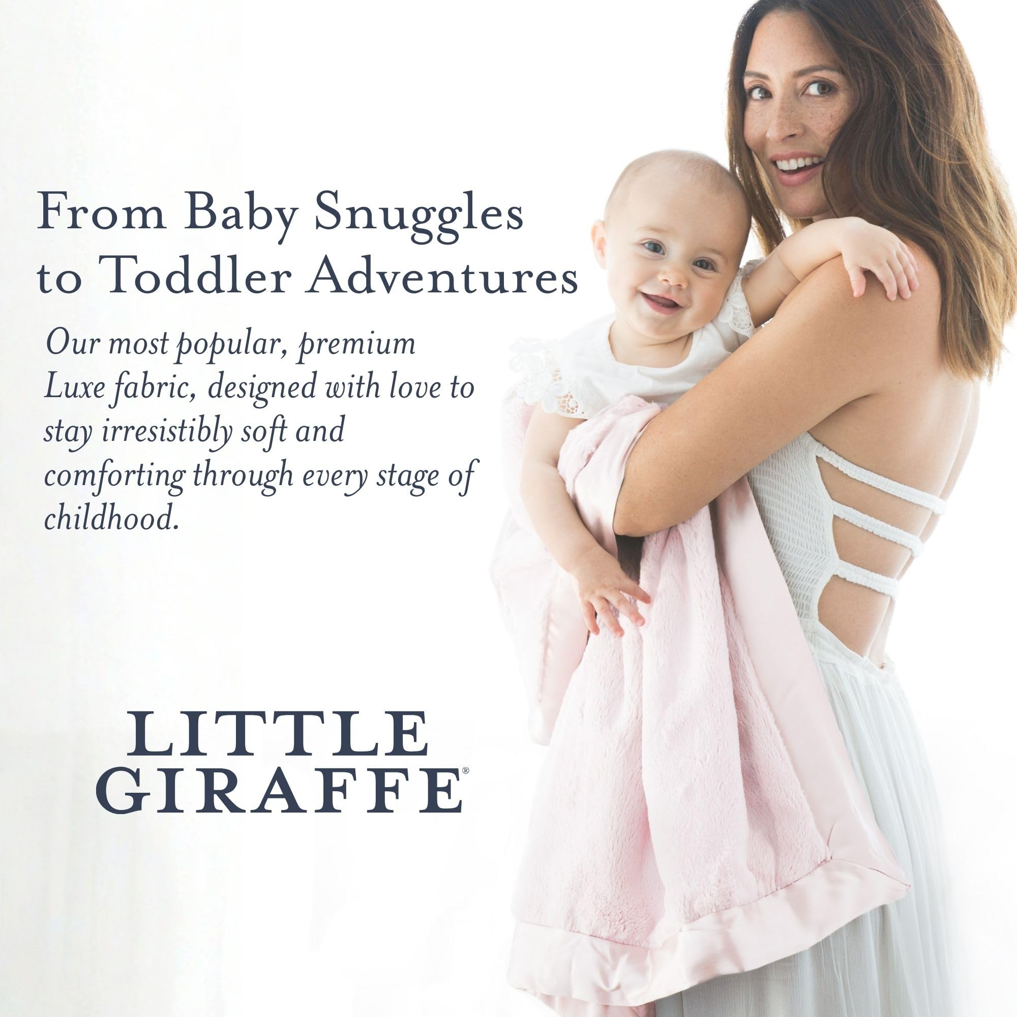 Little Giraffe luxe blanket adds timeless nursery elegance.