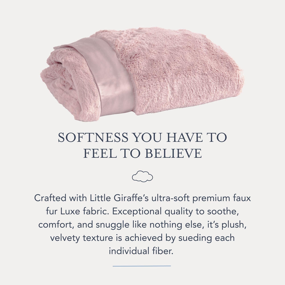 Luxe blanket in a nursery setting, adding timeless elegance to decor.