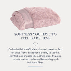 Luxe blanket in a nursery setting, adding timeless elegance to decor.