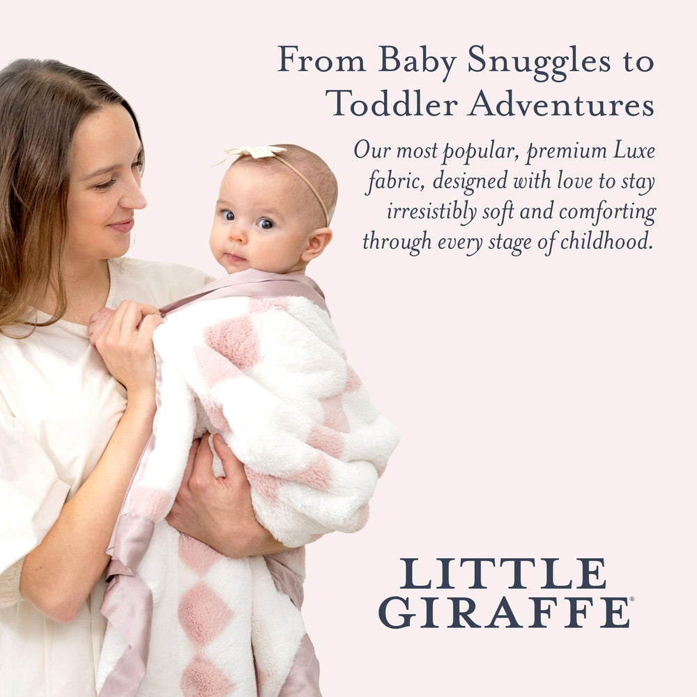 Little Giraffe Luxe Blanket provides on-the-go comfort for stroller travels.