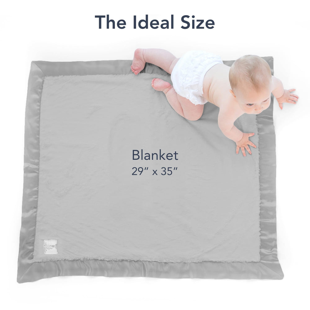Little Giraffe Luxe blanket adds timeless nursery charm.
