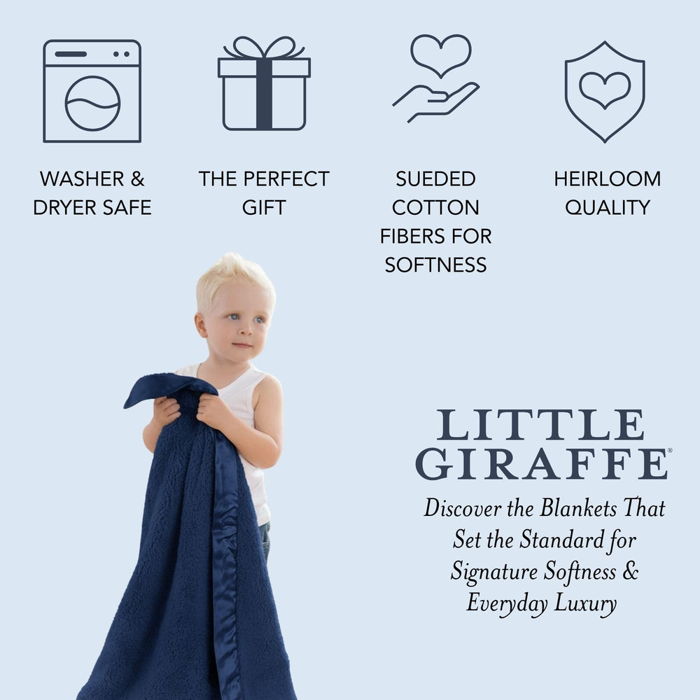 Little Giraffe nursery keepsake blanket enhances decor with soft, lasting comfort.