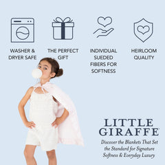 Little Giraffe satin-trim blanket close-up shows buttery faux fur texture.
