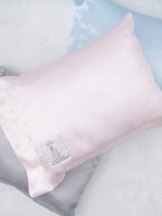 Little Giraffe satin trim detail close-up shows smooth, decorative edge.