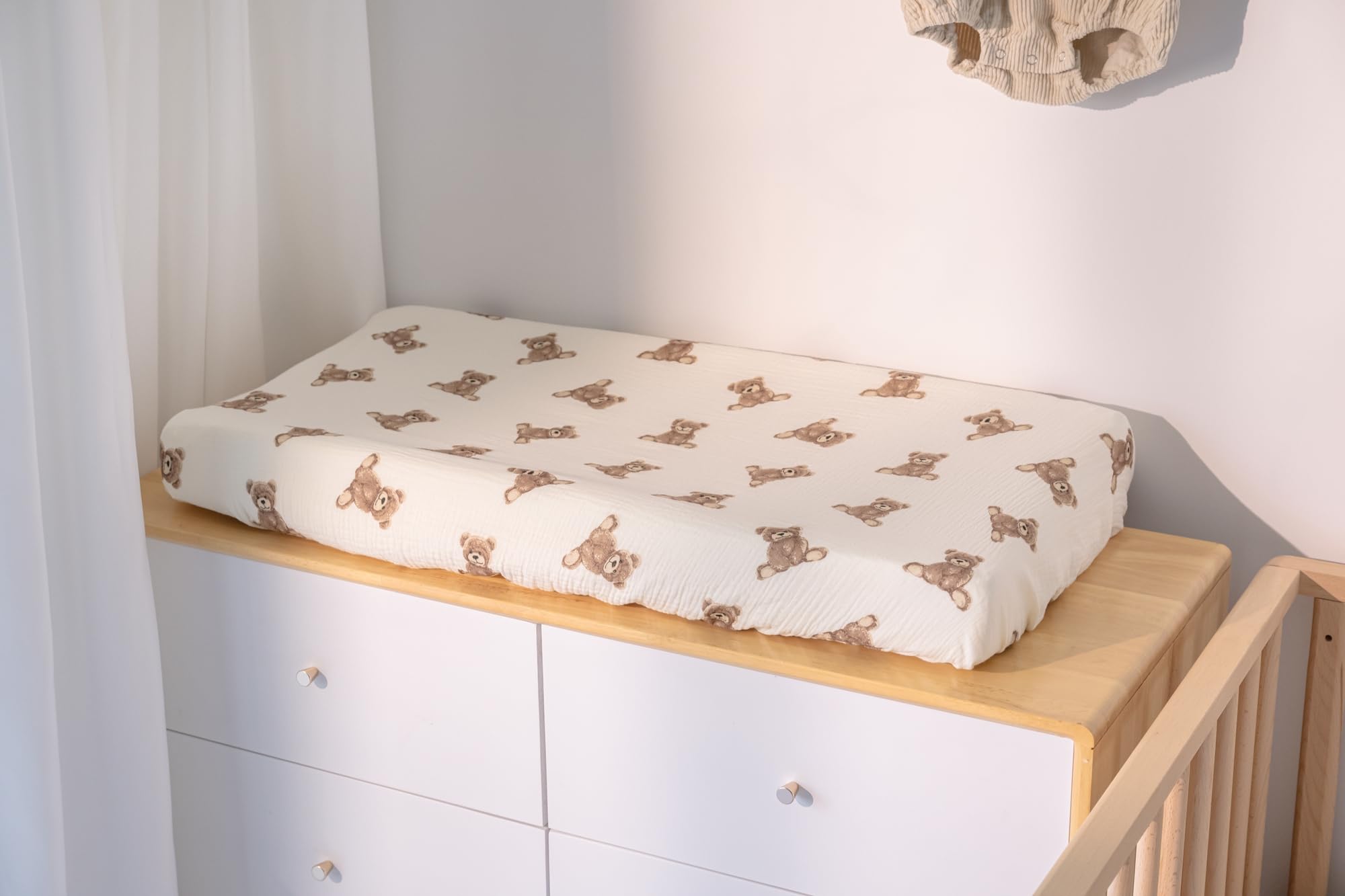 Little Jump contoured pad cover fits 32x16x4 inches snugly on changing surfaces