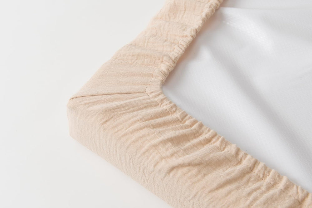 Little Jump snug-fit pocket detail supports secure diaper changes