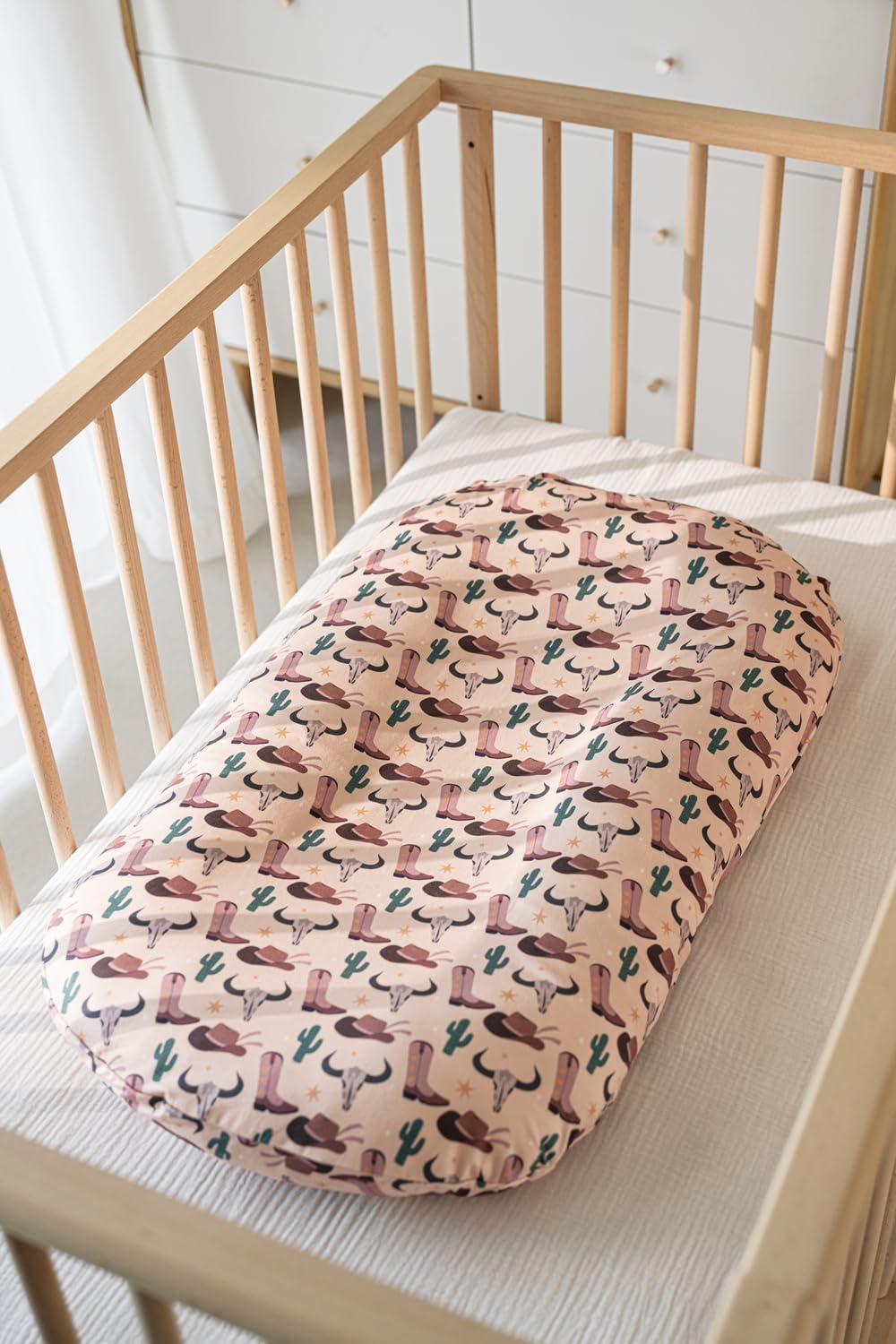Little Jump closeup soft fabric cover emphasizes cozy, easy-care material.