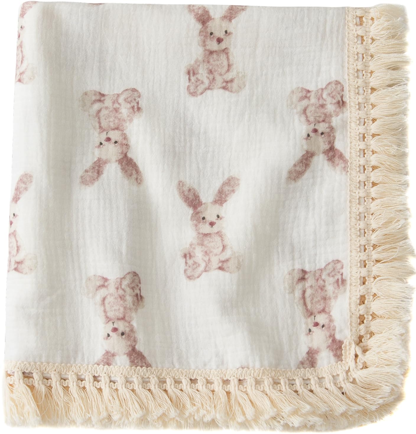 Little Jump cotton muslin swaddle blanket tassel detail for soft, breathable cuddles.