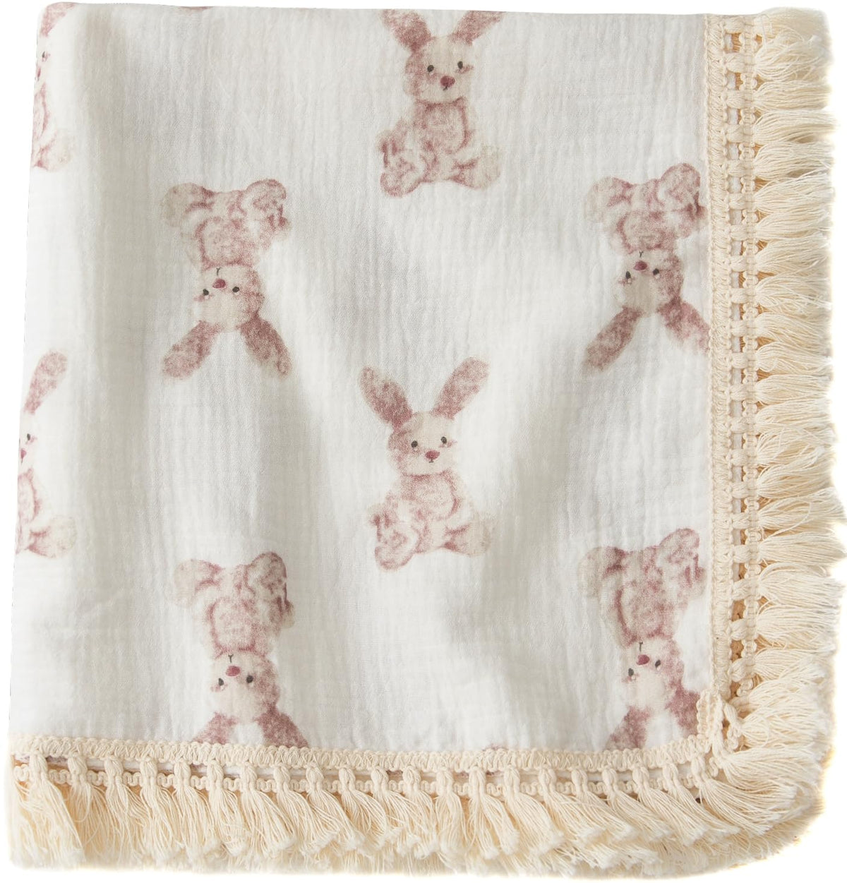 Little Jump cotton muslin swaddle blanket tassel detail for soft, breathable cuddles.