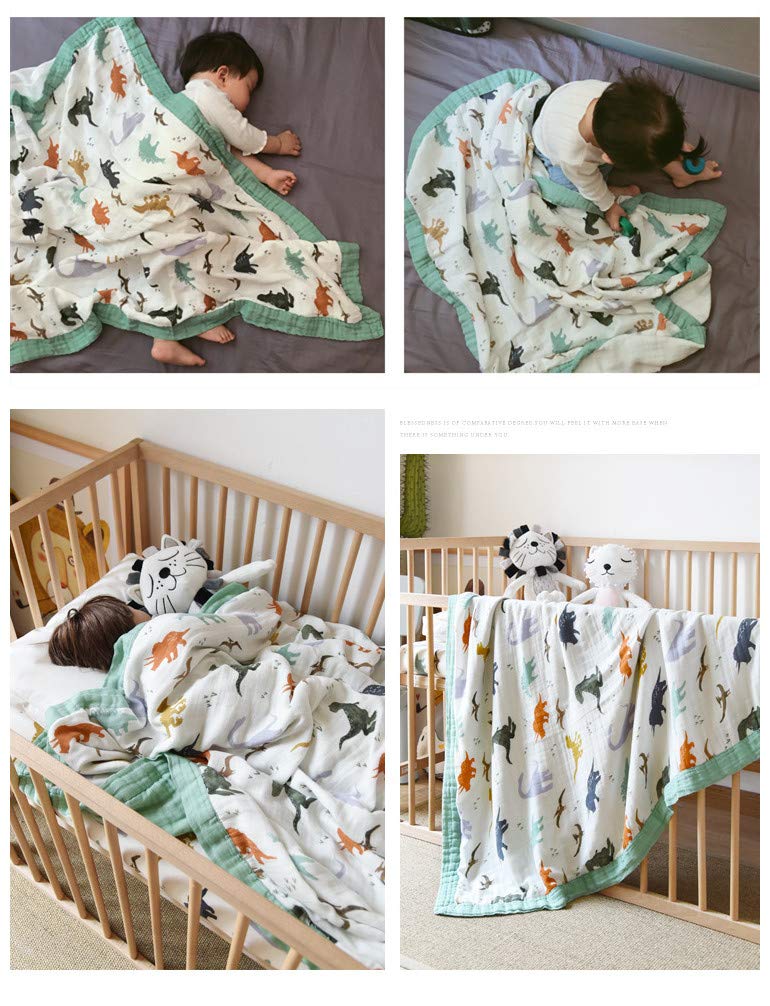 Little Jump Dinosaur Muslin Blanket on crib, breathable warmth for peaceful naps.