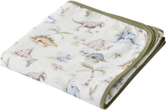 Little Jump Dinosaur Muslin Blanket fabric closeup showing soft cotton texture for baby's skin.