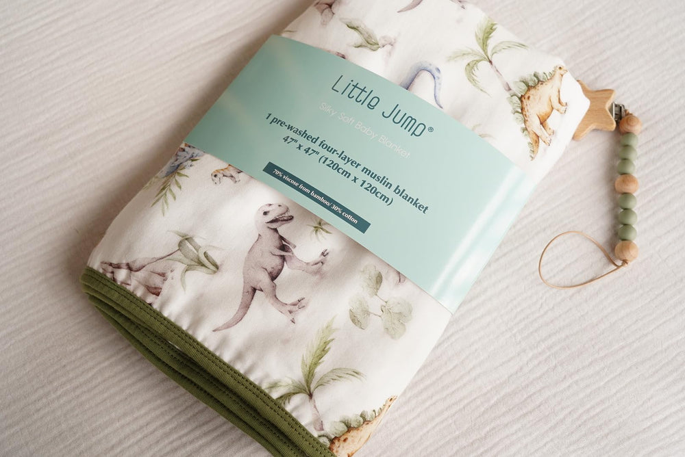 Little Jump Dinosaur Muslin Blanket soft-touch surface ideal for cuddling moments.
