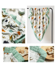 Little Jump Dinosaur Muslin Blanket in stroller, lightweight travel companion.