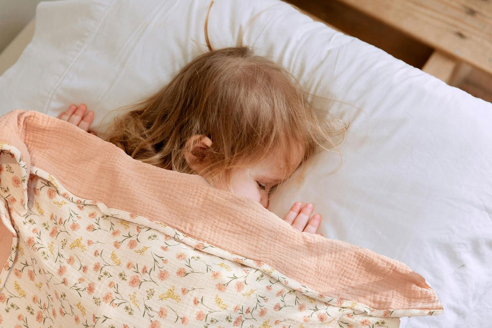 Little Jump muslin blanket peach floral folded display emphasizes large 47x47 size for versatile use.