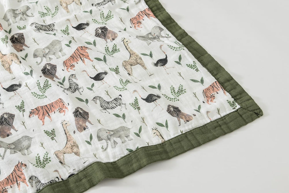 Little Jump jungle print blanket suits crib, stroller, and floor playtime.