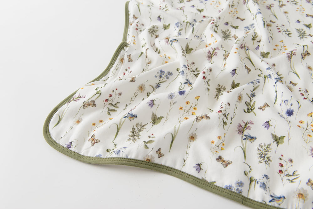 Little Jump neutral boho nursery blanket blends with decor and stays breathable