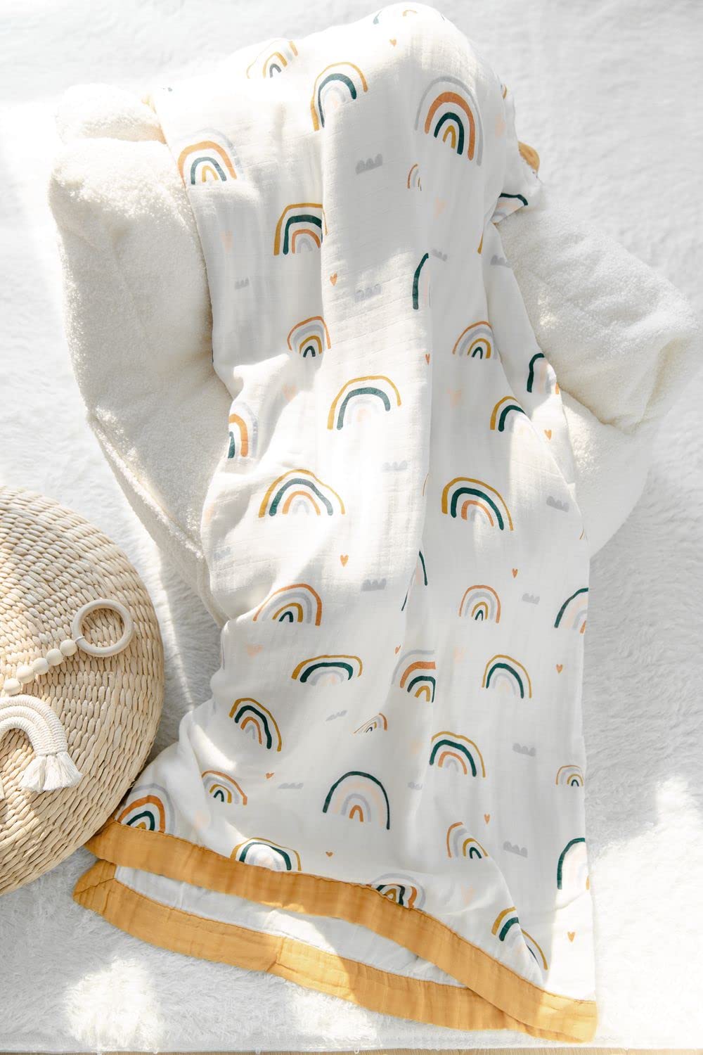 Two-layer muslin construction on Little Jump Rainbow Quilt for tummy time.