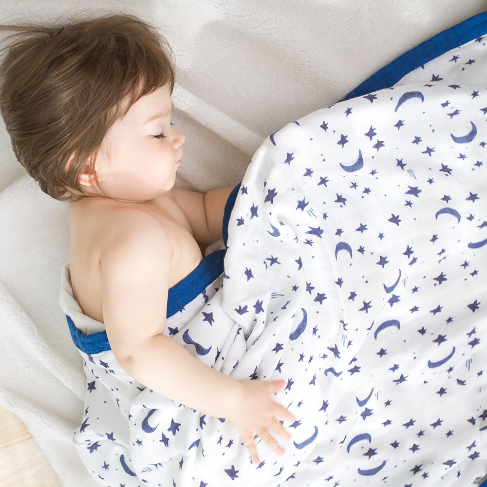Little Jump Starry Sky blanket folded, showcasing its oversized 47x47 inch muslin design.