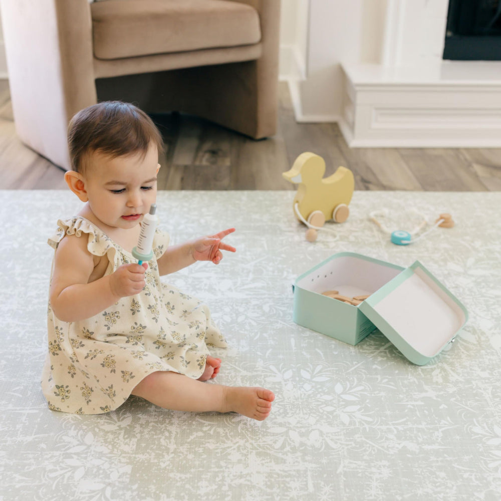 Eden play mat set up in a living room creates a versatile play area.